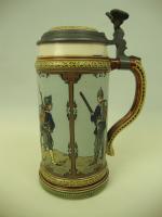 Stein with panels of soldiers