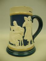 relief decorated stein