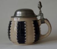 art deco stein