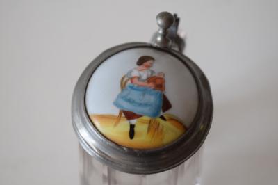 Glass child's stein with porcelain inlaid lid