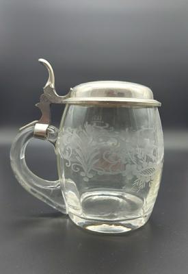 Carved glass stein